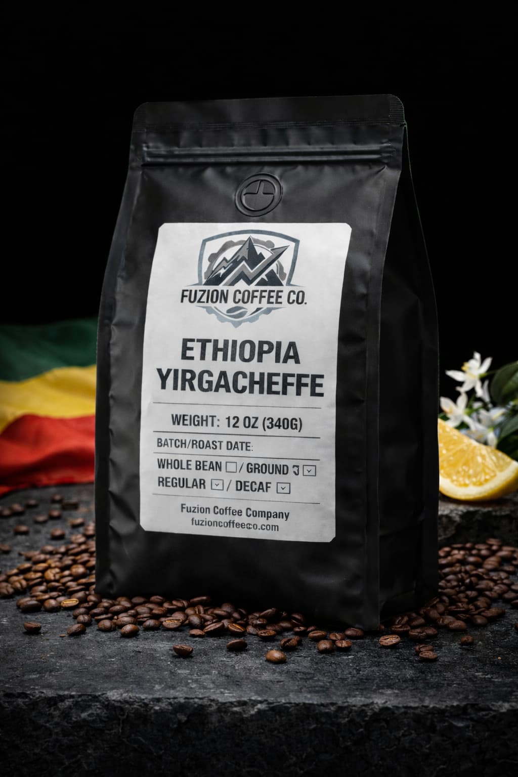 Matte black Ethiopia Yirgacheffe coffee bag by Fuzion Coffee Co on dark marble surface with lightly scattered coffee beans and cool studio lighting