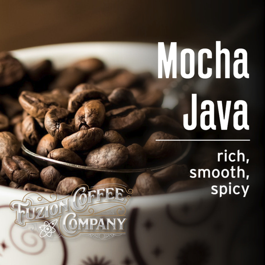 Cup of coffee with mocha java beans and Fuzion Coffee Company branding.