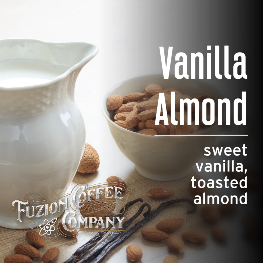 Vanilla Almond coffee blend with almonds, vanilla beans, and a white pitcher on a light background.